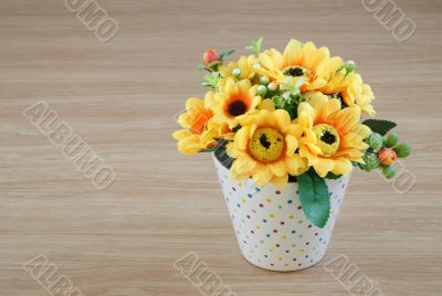 Decorative flower on wooden desk