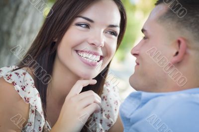 Mixed Race Romantic Couple Portrait in the Park