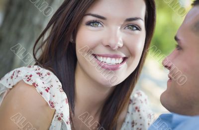 Mixed Race Romantic Couple Portrait in the Park