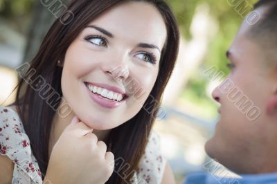 Mixed Race Romantic Couple Portrait in the Park