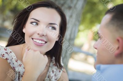 Mixed Race Romantic Couple Portrait in the Park