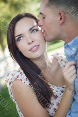 Mixed Race Romantic Couple Portrait in the Park