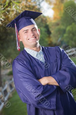 Handsome Male Graduate in Cap and Gown