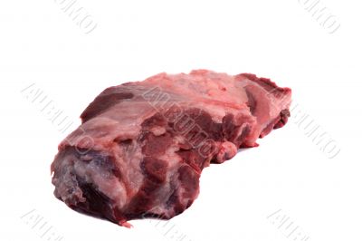 A large piece of raw pork meat on a white background.