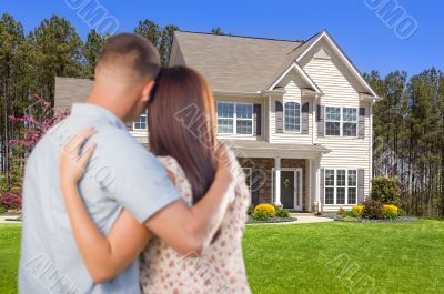 Military Couple Looking at Nice New House