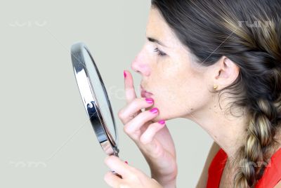 Checking herelf in the mirror Checking herelf in the mirror