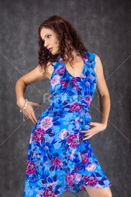 female dressed in a blue dress