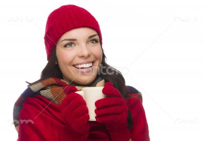 Mixed Race Woman Wearing Mittens Holds Mug Looks to Side