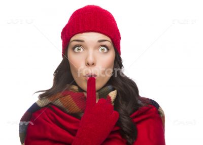 Wide Eyed Mixed Race Woman Wearing Winter Hat and Gloves 