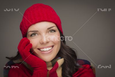 Smilng Mixed Race Woman Wearing Winter Hat and Gloves 