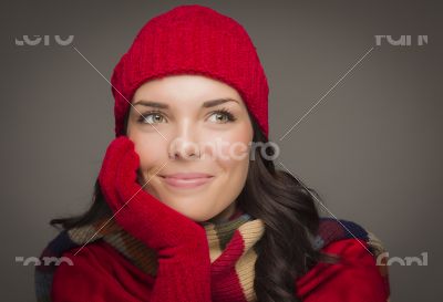 Mixed Race Woman Wearing Mittens Looks to Side Mixed Race Woman Wearing Mittens Looks to Side