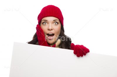 Shocked Girl Wearing Winter Hat and Gloves Holds Blank Sign 