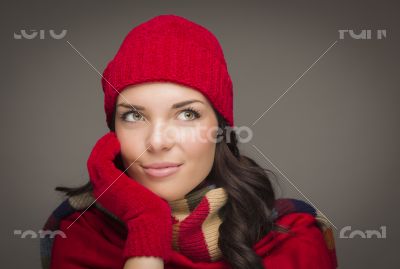 Smiling Mixed Race Woman Wearing Mittens Looks to Side