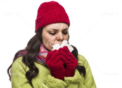 Sick Mixed Race Woman Blowing Her Sore Nose with Tissue