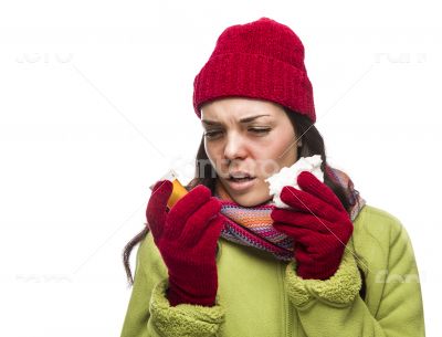 Sick Mixed Race Woman with Empty Medicine Bottles Blowing Nose 