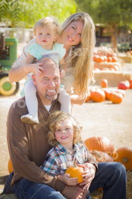 Attractive Family Portrait at the Pumpkin Patch