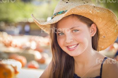 Preteen Girl Portrait Wearing Cowboy Hat at Pumpkin Patch