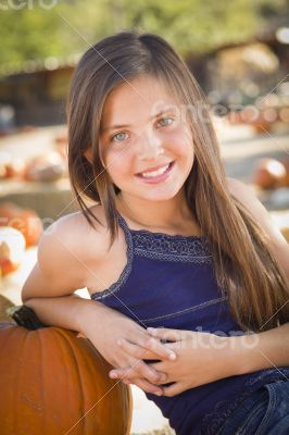 Preteen Girl Portrait at the Pumpkin Patch Preteen Girl Portrait at the Pumpkin Patch
