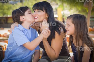 Attractive Mixed Race Family Portrait at the Pumpkin Patch