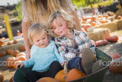 Young Family Enjoys a Day at the Pumpkin Patch Young Family Enjoys a Day at the Pumpkin Patch