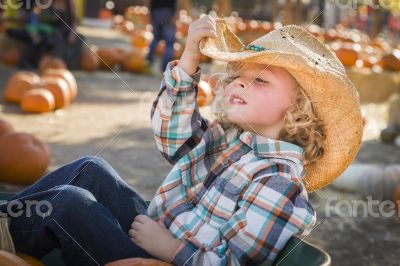 Little Boy in Cowboy Hat at Pumpkin Patch Little Boy in Cowboy Hat at Pumpkin Patch