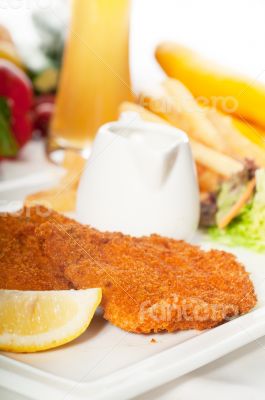 classic Milanese veal cutlets and vegetables