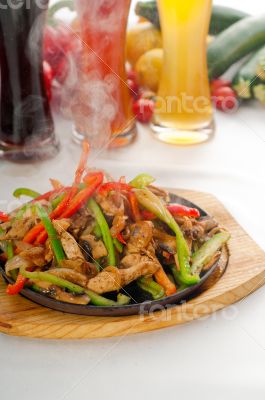 original fajita sizzling hot  on iron plate