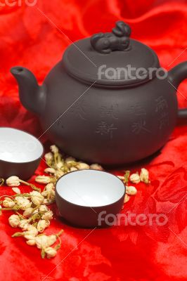jasmine tea over red silk