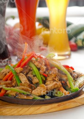 original fajita sizzling hot  on iron plate