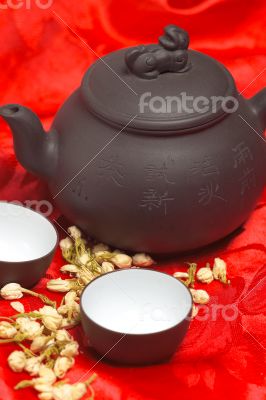 jasmine tea over red silk