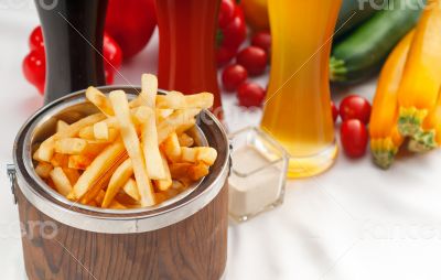 fresh french fries on a bucket