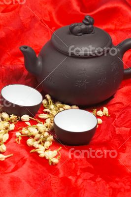 jasmine tea over red silk