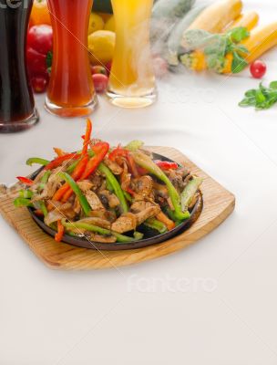 original fajita sizzling hot  on iron plate