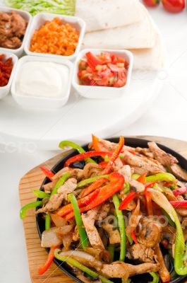 original fajita sizzling hot  on iron plate