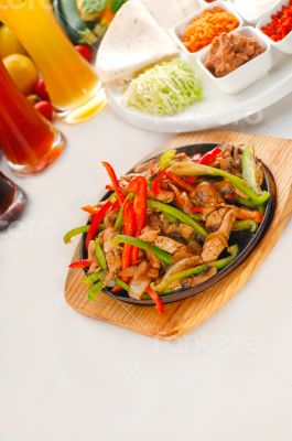 original fajita sizzling hot  on iron plate