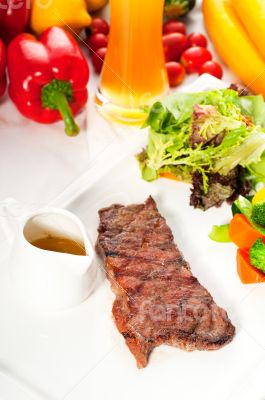 juicy BBQ grilled rib eye ,ribeye steak and vegetables