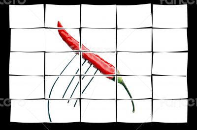 red chili pepper on a fork