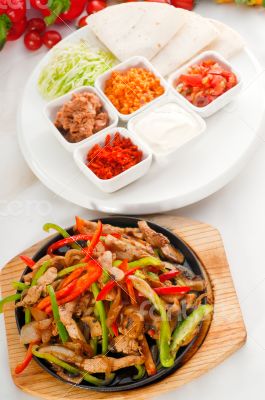 original fajita sizzling hot  on iron plate