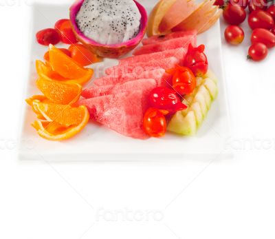 mixed plate of fresh sliced fruits