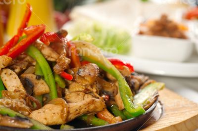 original fajita sizzling hot  on iron plate