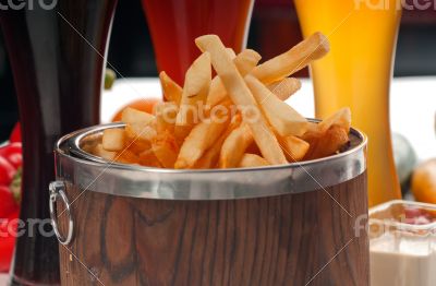 fresh french fries on a bucket