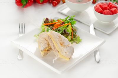 tuna and cheese sandwich with salad