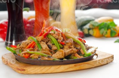 original fajita sizzling hot  on iron plate