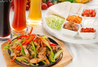 original fajita sizzling hot  on iron plate