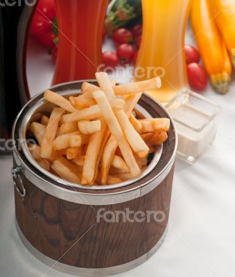 fresh french fries on a bucket