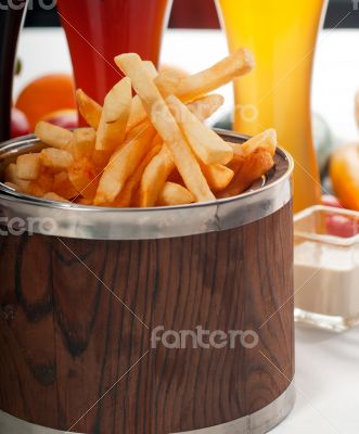 fresh french fries on a bucket