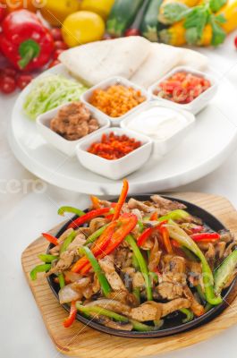 original fajita sizzling hot  on iron plate