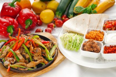 original fajita sizzling hot  on iron plate