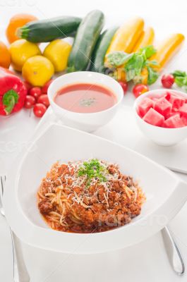 spaghetti with bolognese sauce with gazpacho soup and fresh vege