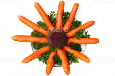 Carrots, beets, parsley on the plate on a white background.